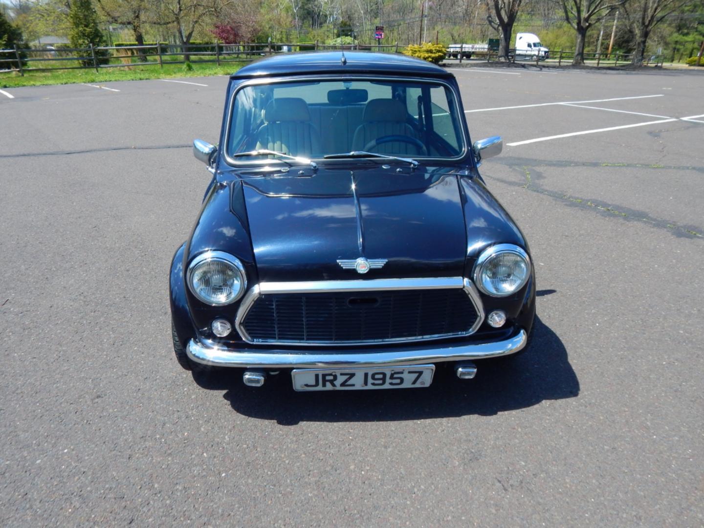 1984 Blue /Beige Leather Austin Mini Sport (A/A25751477) with an 1275cc 4 cylinder engine, Manual transmission, located at 6528 Lower York Road, New Hope, PA, 18938, (215) 862-9555, 40.358707, -74.977882 - The title to this car says she is a 1964, however in the sixties the door hinges were on the outside of the doors, also the windows in the sixties cars were sliding instead of roll up. We believe the year of this vehicle is 1984 due to the rear taillights. Here we have a beautifully restored A - Photo#4